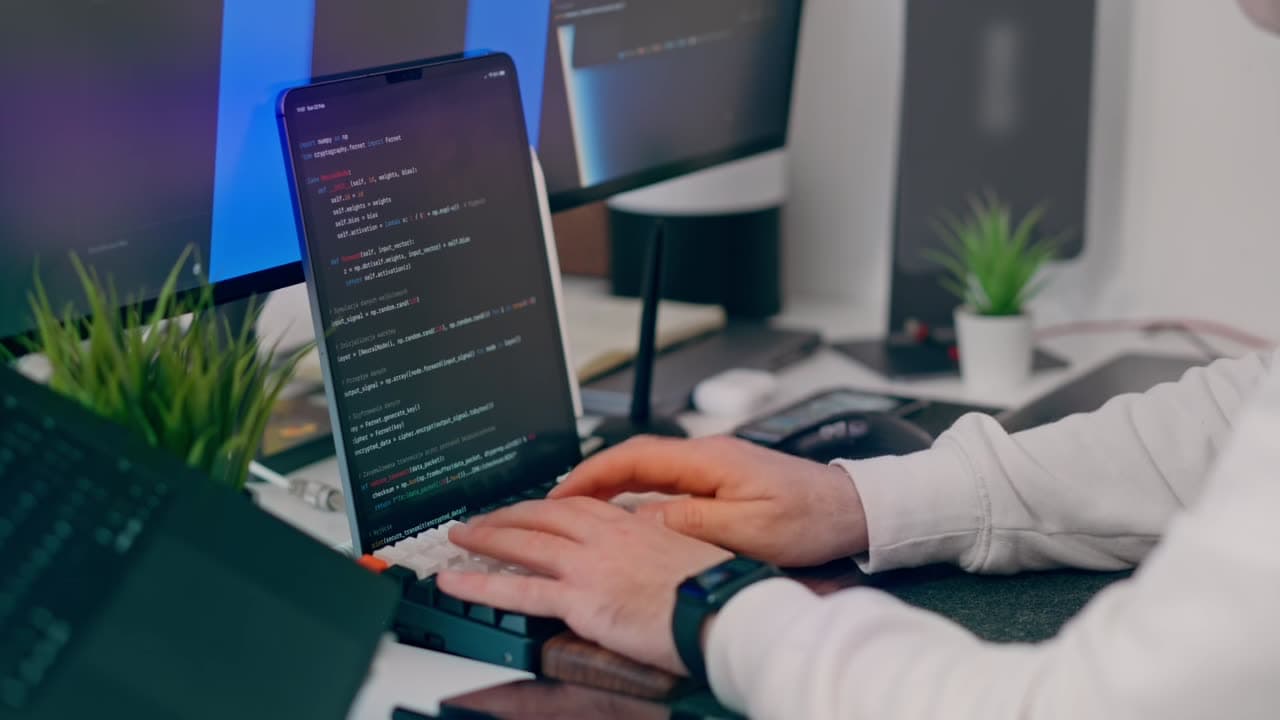 Code being written in a bright workspace